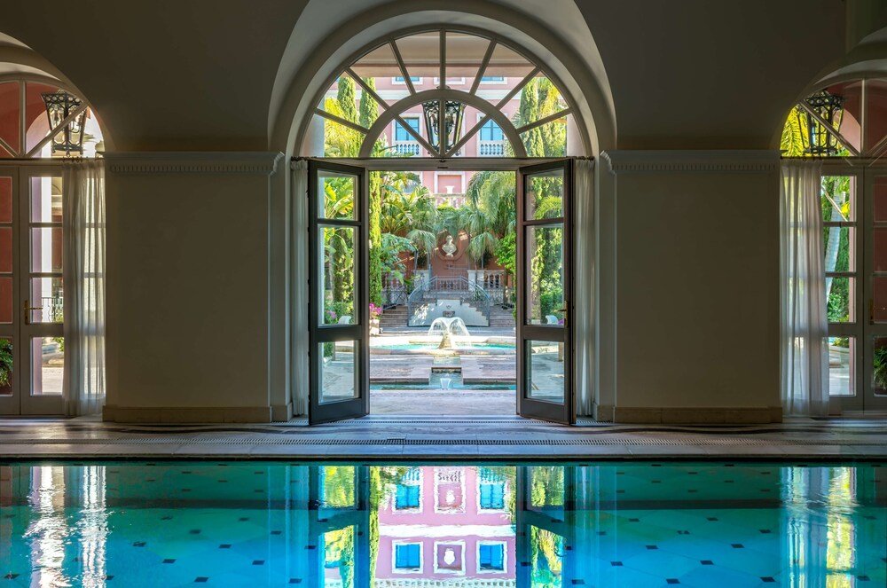 Resort pool area with a view over the surrounding grounds
