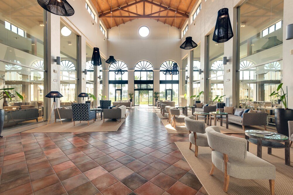 Hotel lobby with seating area at the Costa Ballena resort