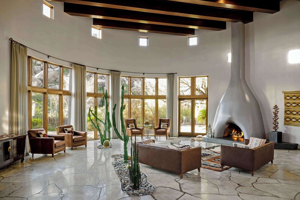 Spacious living room with a fireplace in a guest accommodation
