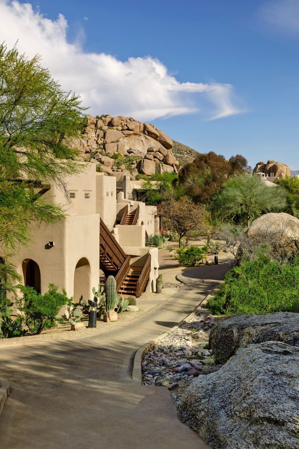 Desert-style building with arched doorways at the resort