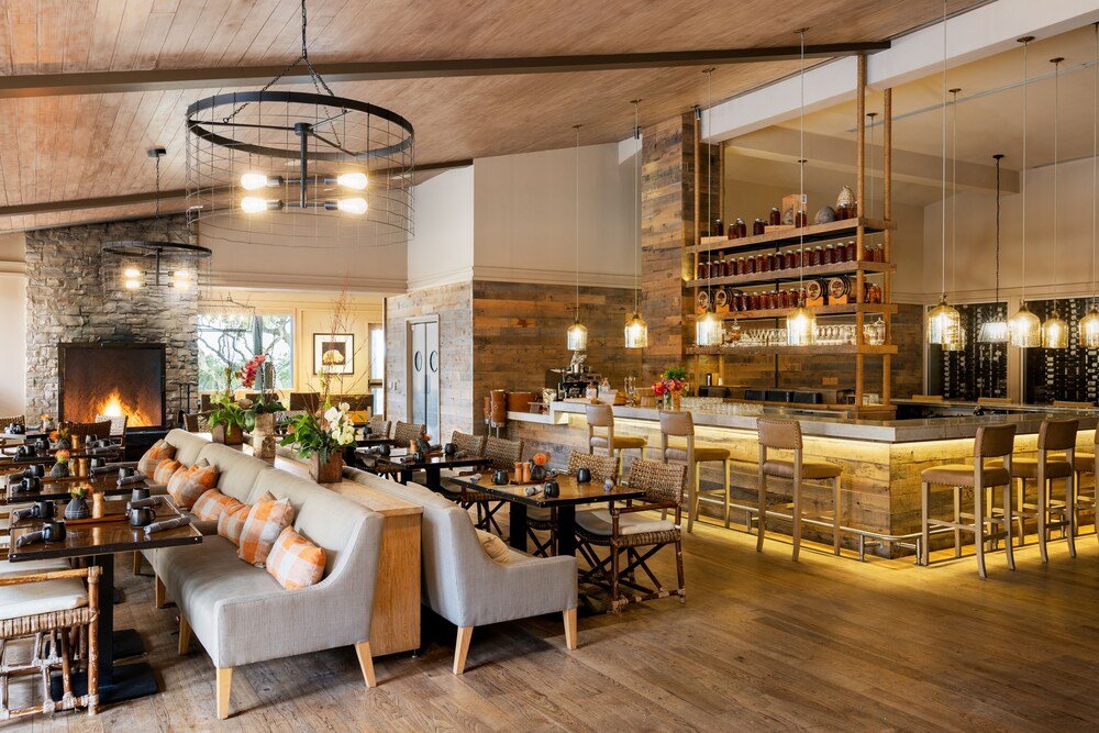Spacious lounge area with a long sofa at Carmel Valley Ranch, California