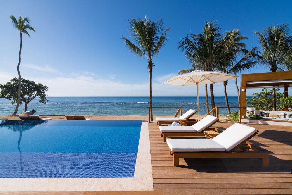 Poolside area with loungers at the resort at Casa de Campo, La Romana