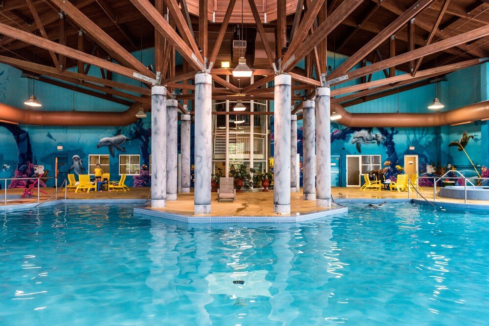 Indoor swimming pool with clear blue water at Deerhurst Resort, Muskoka, Ontario
