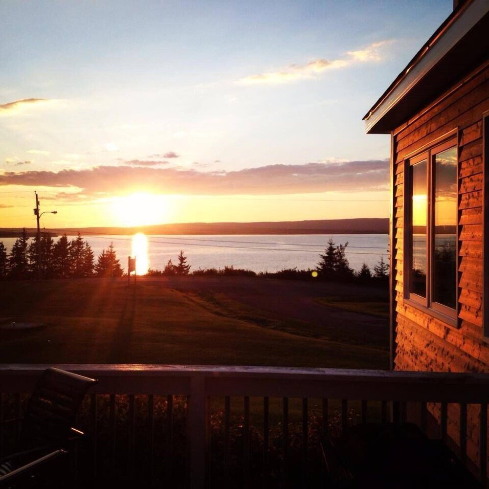 Wooden cabin with a view of the sunset