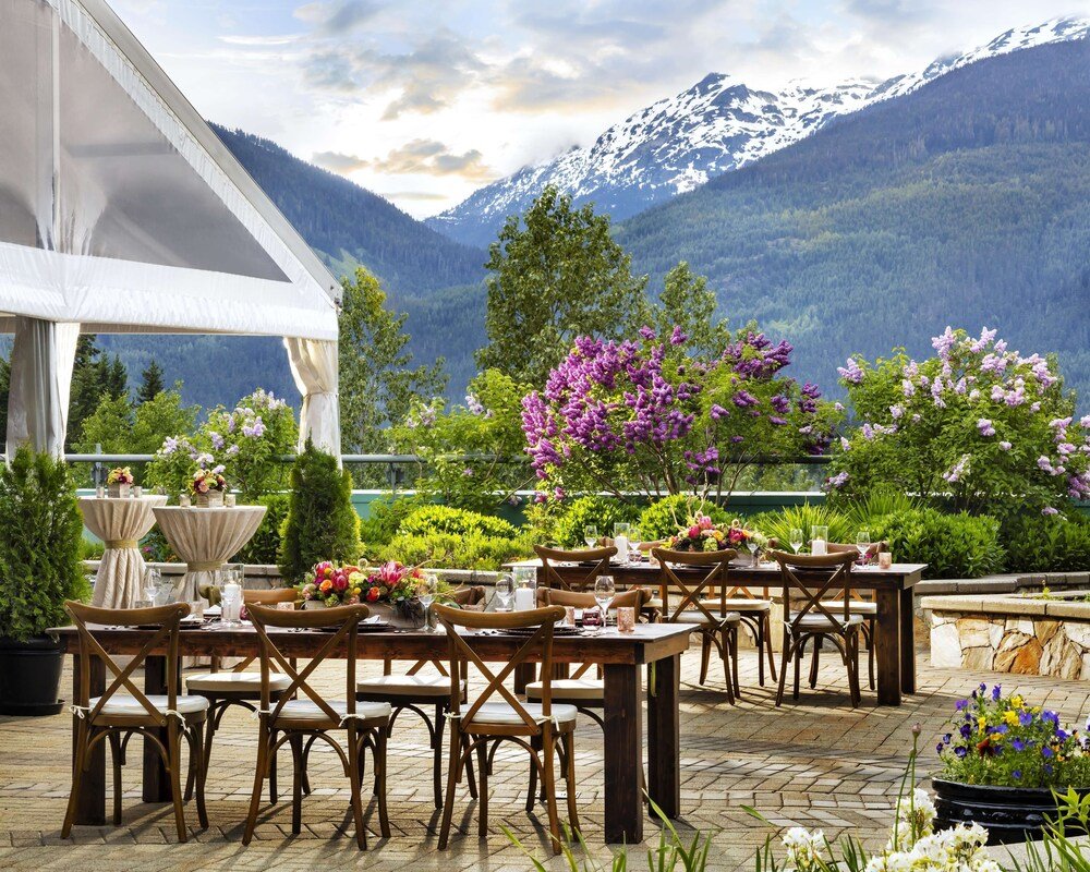 Outdoor dining area with tables and chairs
