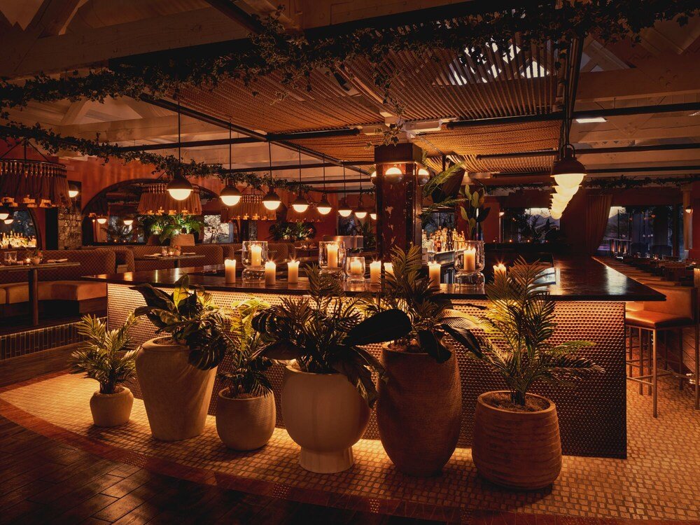 Well-lit indoor space with multiple seating areas