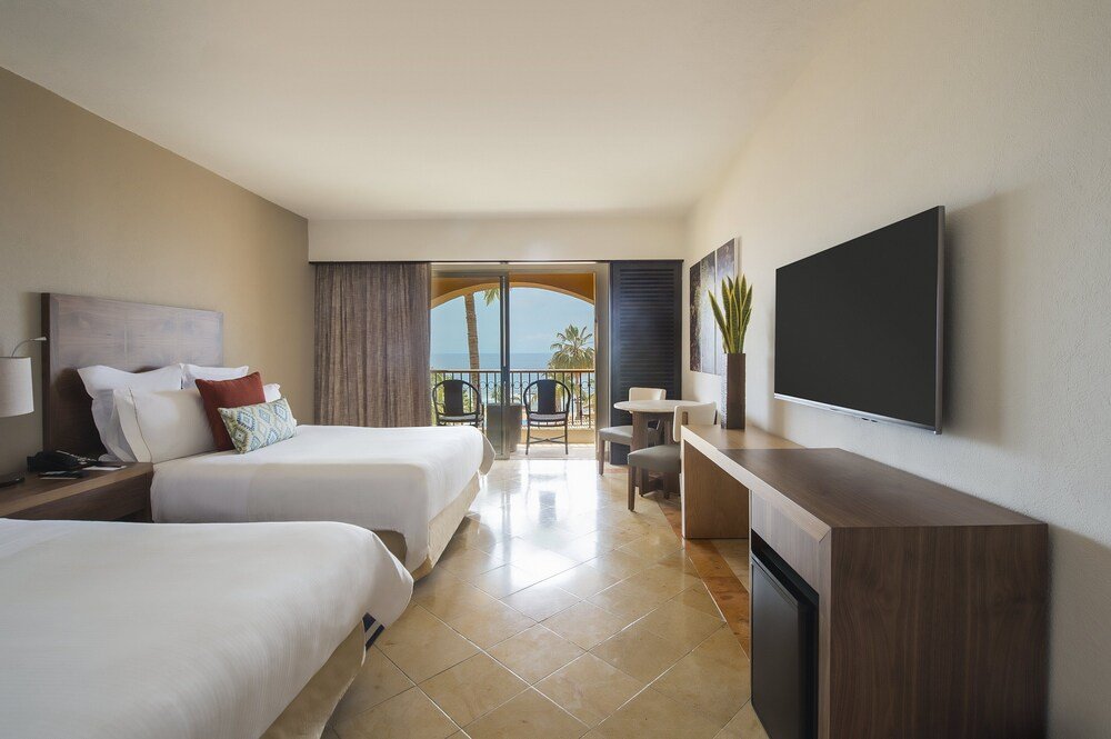 Segunda habitación del hotel con dos camas en el resort