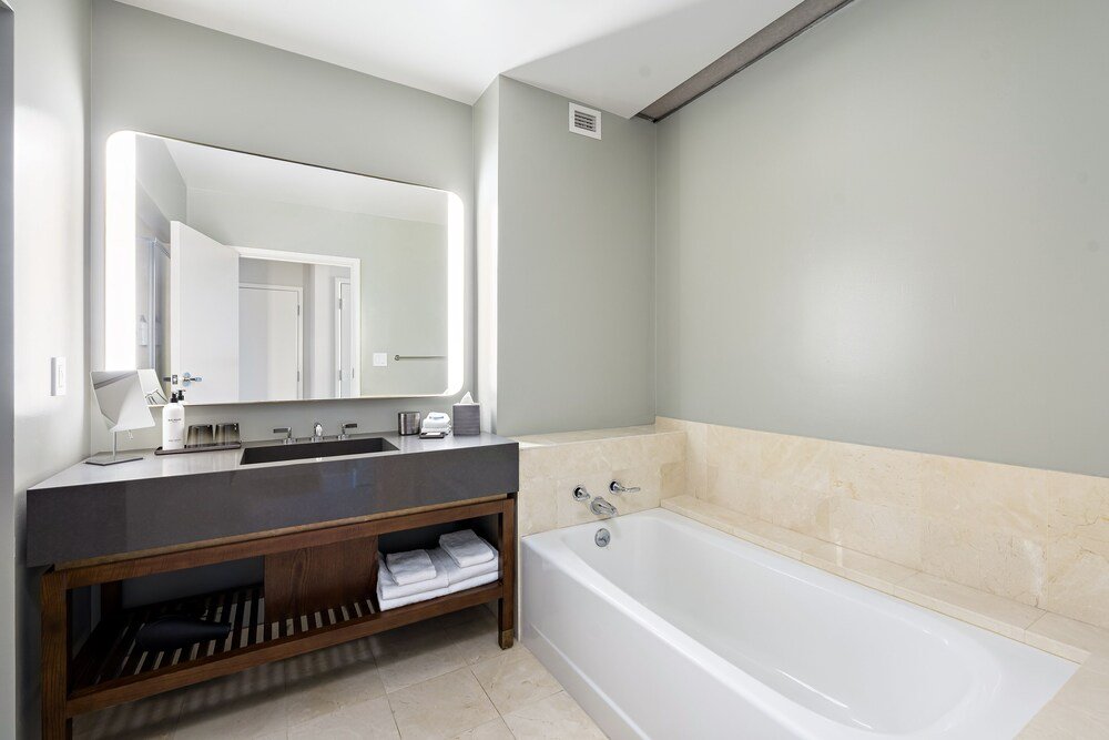 Modern bathroom with a bathtub at the resort