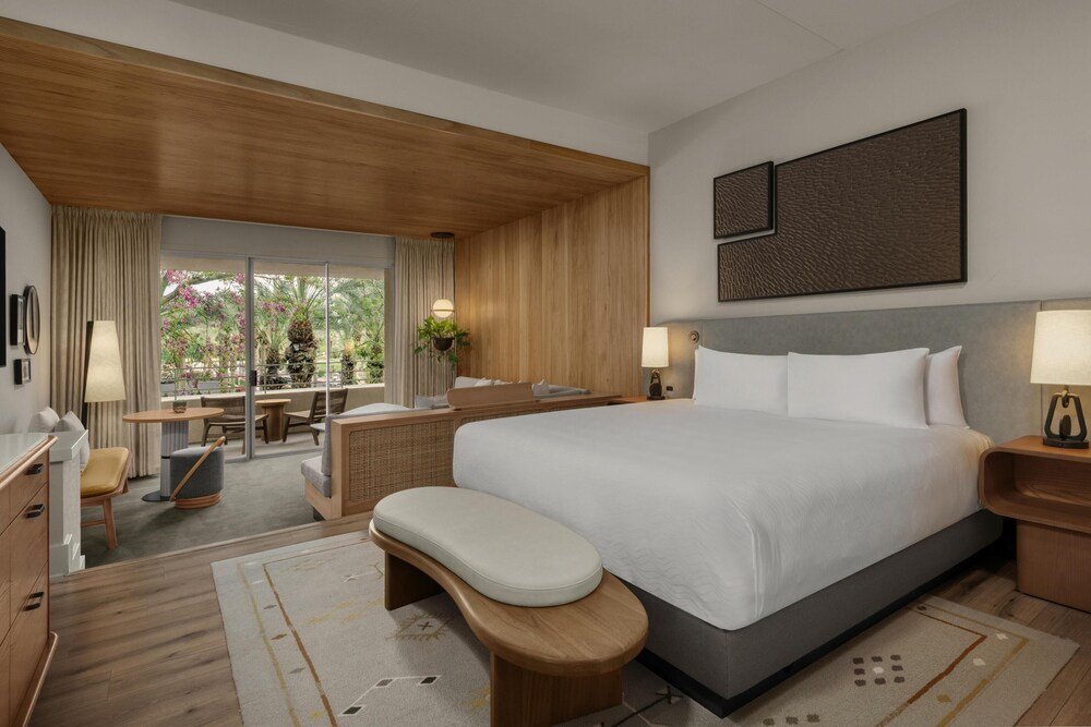 Hotel room with a large bed and seating area