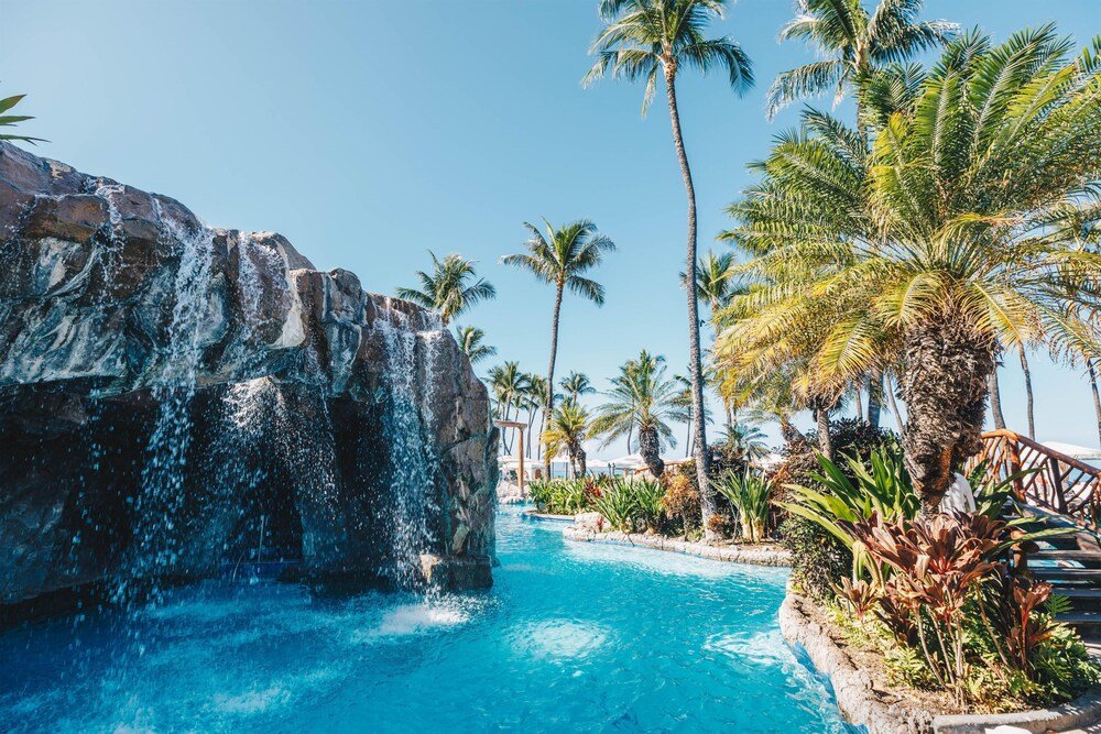 Pool with a waterfall feature at the resort