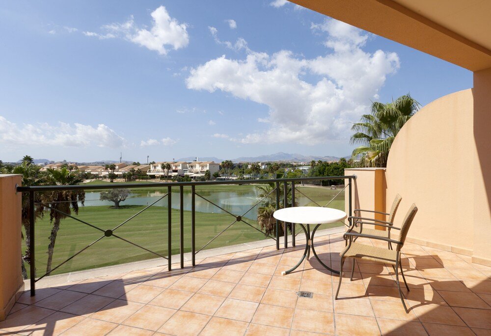 Balcony with a view over the golf course at Hotel Alicante Golf