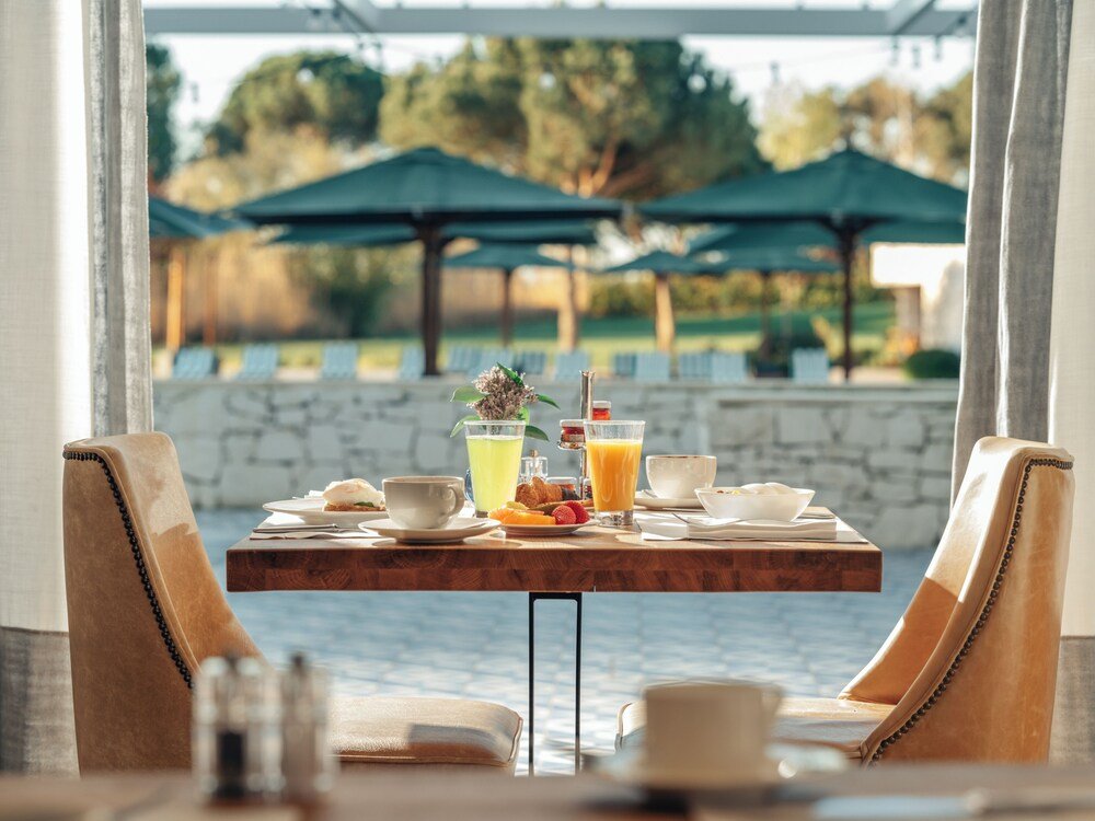 Breakfast table set at Hotel Camiral, PGA Catalunya Resort
