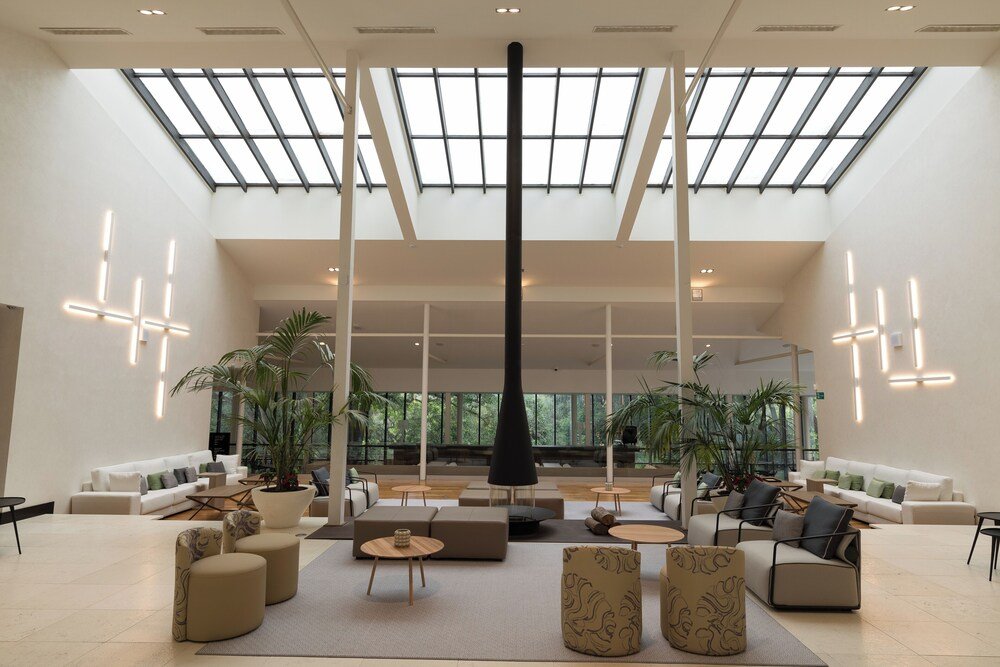 Hotel lobby with seating at Hotel Encinar de Sotogrande