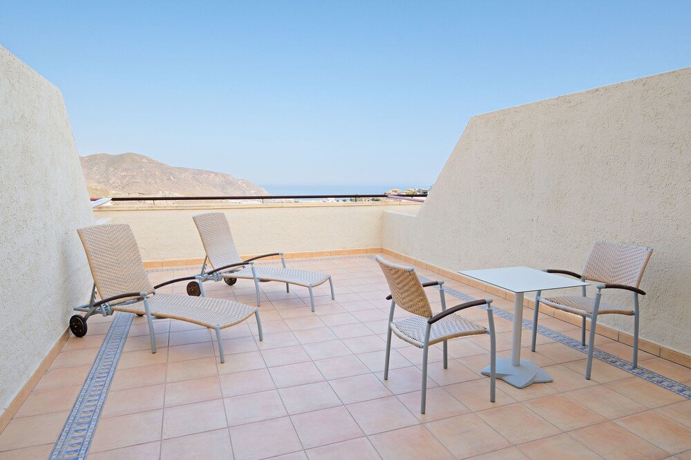 Terrace with seating at the hotel in Vícar, Spain
