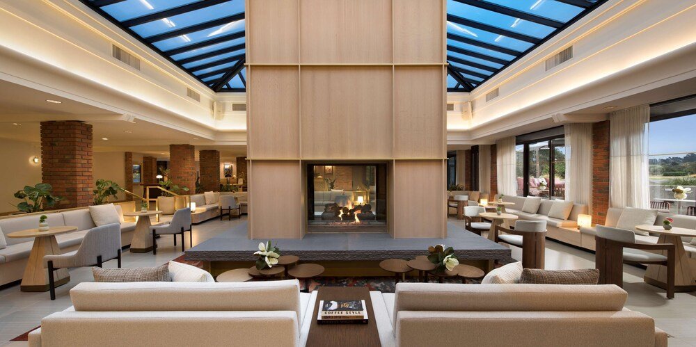 Spacious indoor area with a high ceiling at the resort