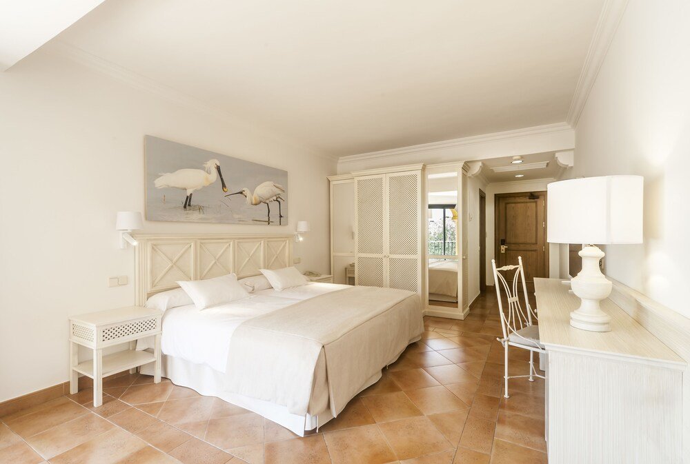 Bedroom with a bed at Iberostar Selection Andalucía Playa