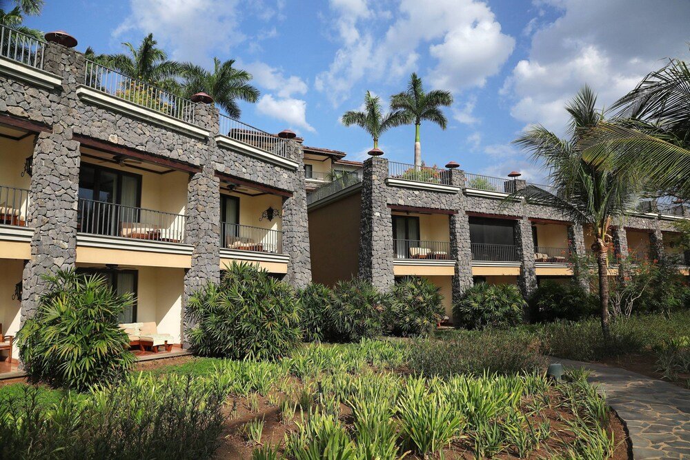 Hotel building with stone pillars at the resort