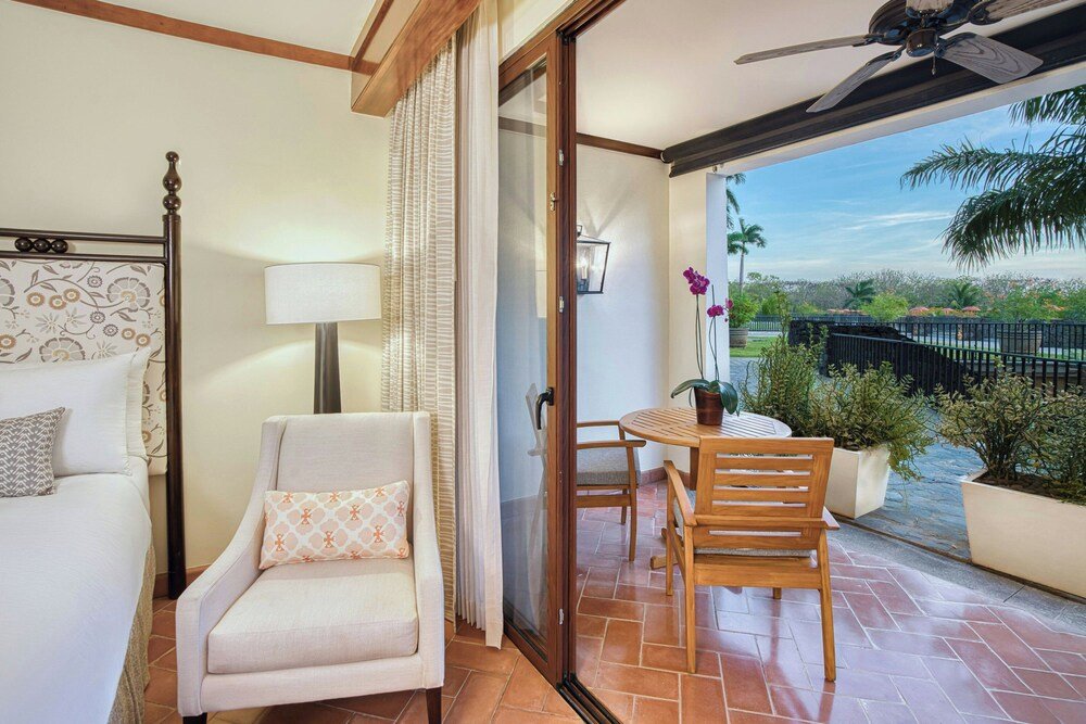 Balcony with a sofa at the resort seen during a visit