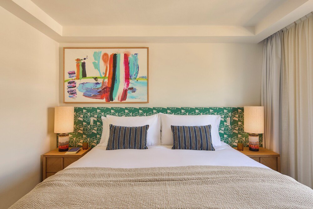 Hotel room with a bed and soft lighting in Marbella