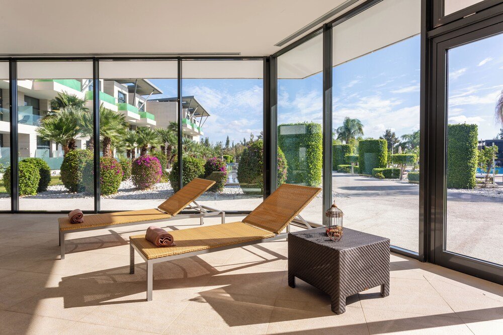 Sunlit lounge area at La Finca Resort, Algorfa
