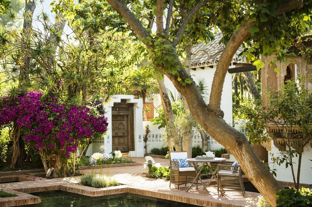 Courtyard with a pool at the resort in Marbella