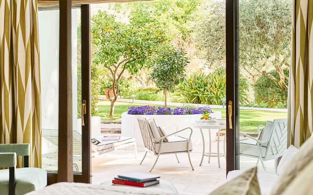 Room with a sliding glass door at Marbella Club Hotel
