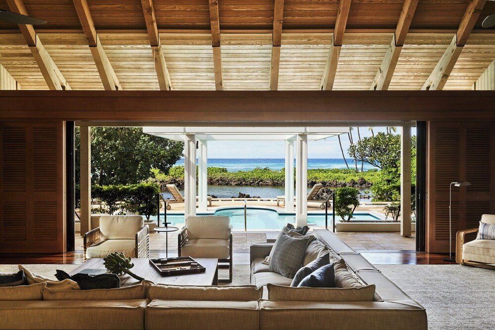 Open-plan living area with a view of the pool