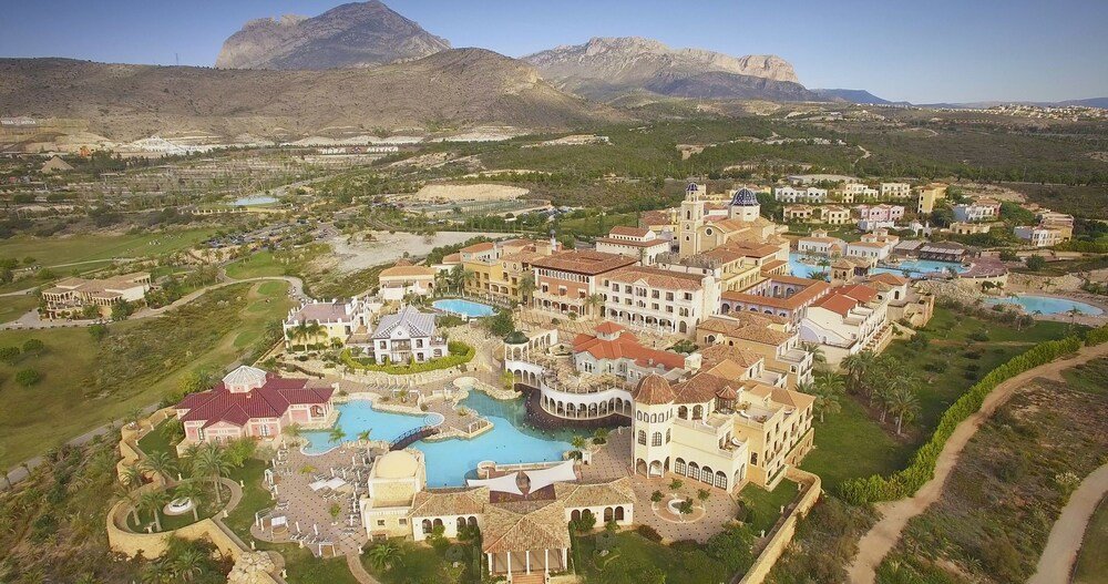 Several swimming pools spread across the resort grounds