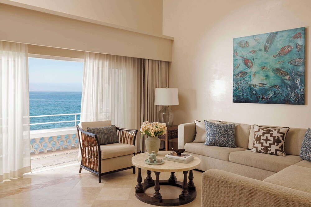 Living room area with a view in a resort suite