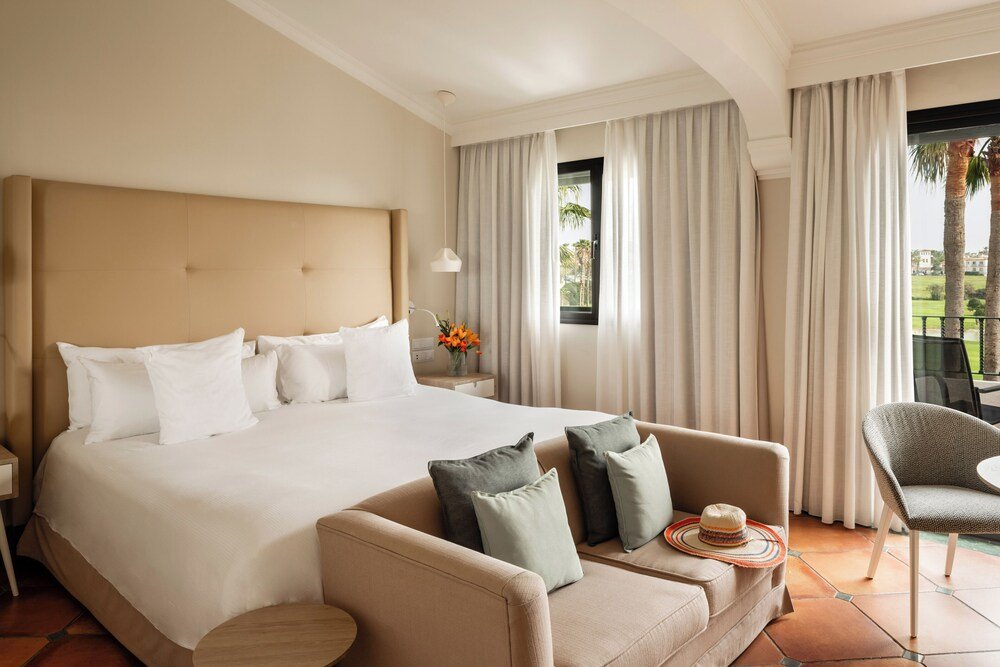 Hotel room with a large bed at the beachfront resort