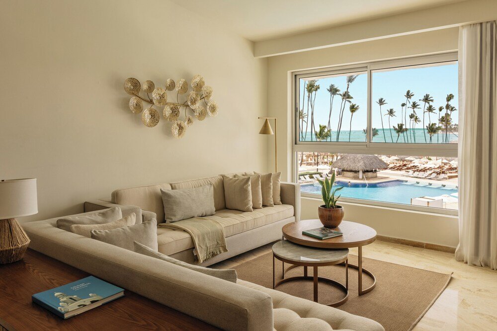 Modern living room area in a suite at Paradisus Palma Real in Bávaro, Punta
