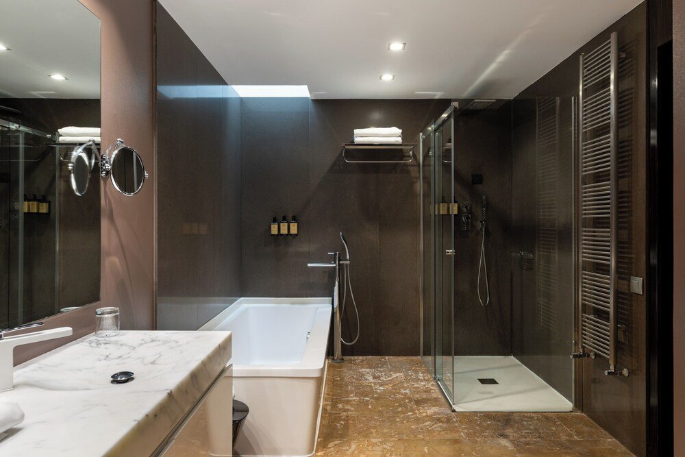 Hotel bathroom with a vanity and shower area