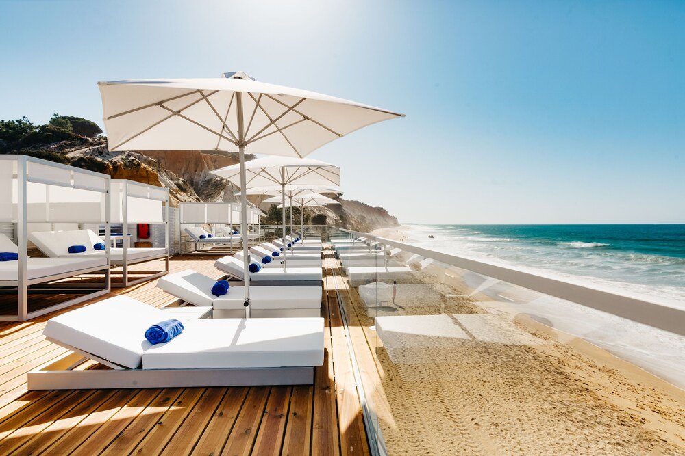 Beachside lounge area at the resort at Pine Cliffs Resort in Albufeira, Algarve