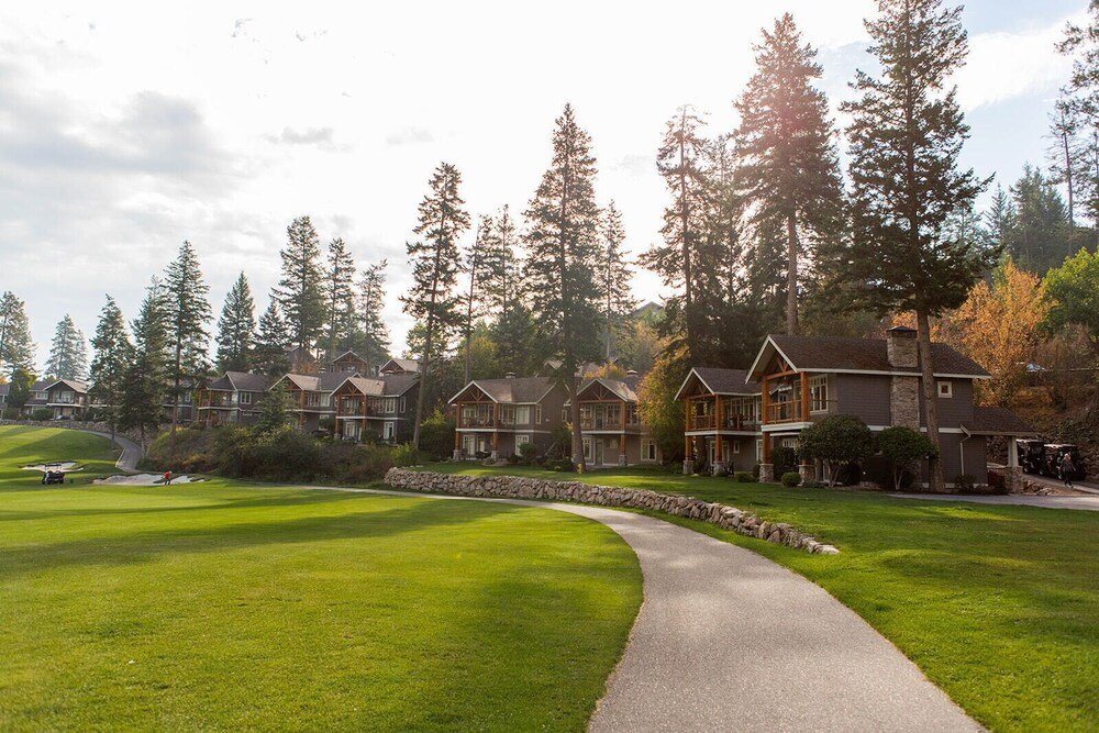 Golf course with a stone wall and a pathway