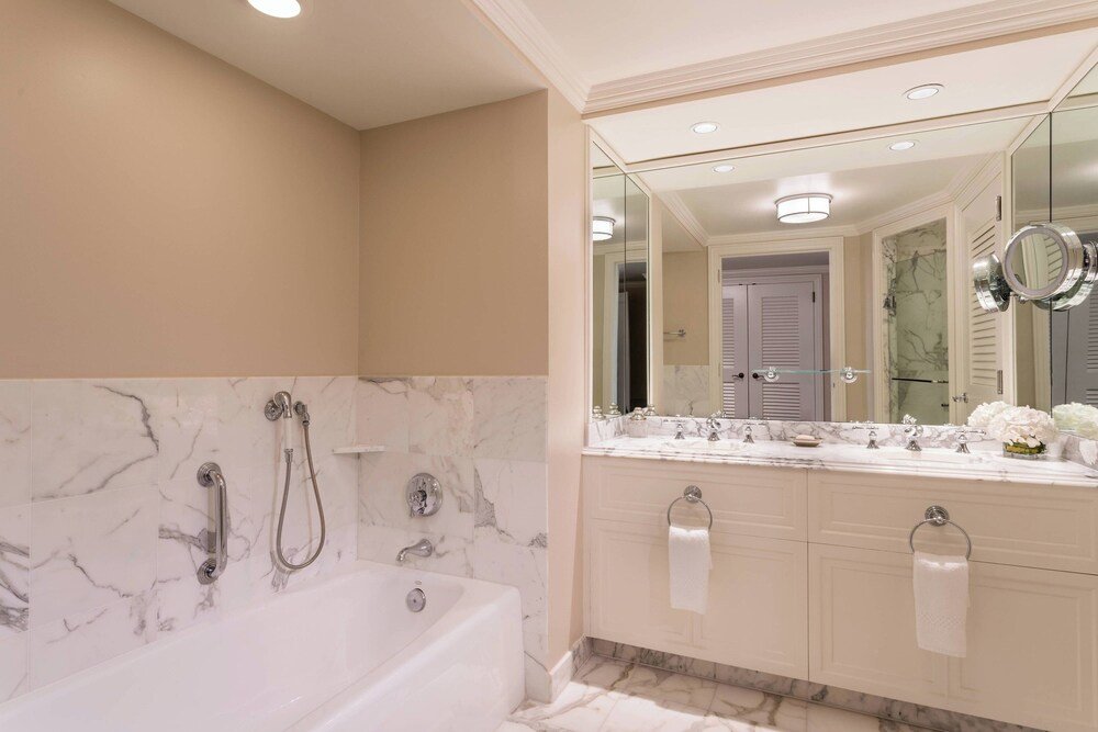 Marble bathroom with a bathtub