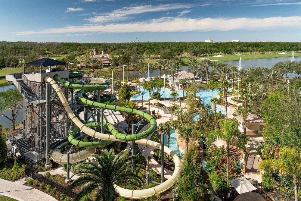 Water park with several slides and a pool