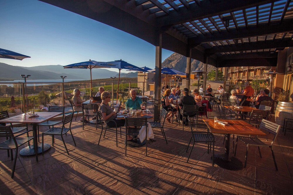 Outdoor dining area with tables and chairs