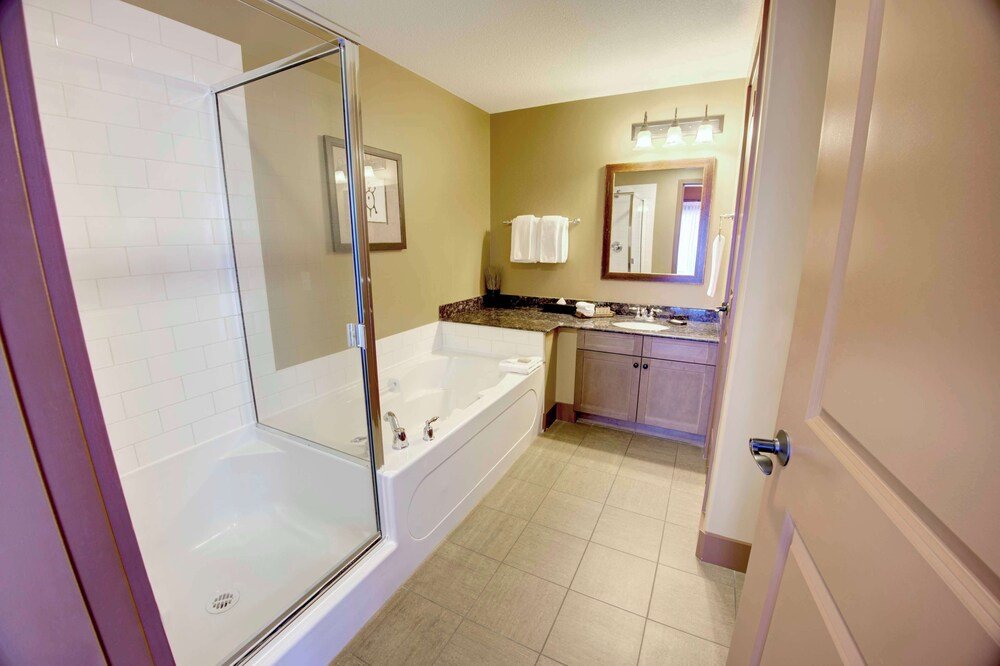 Bathroom with a glass-enclosed shower