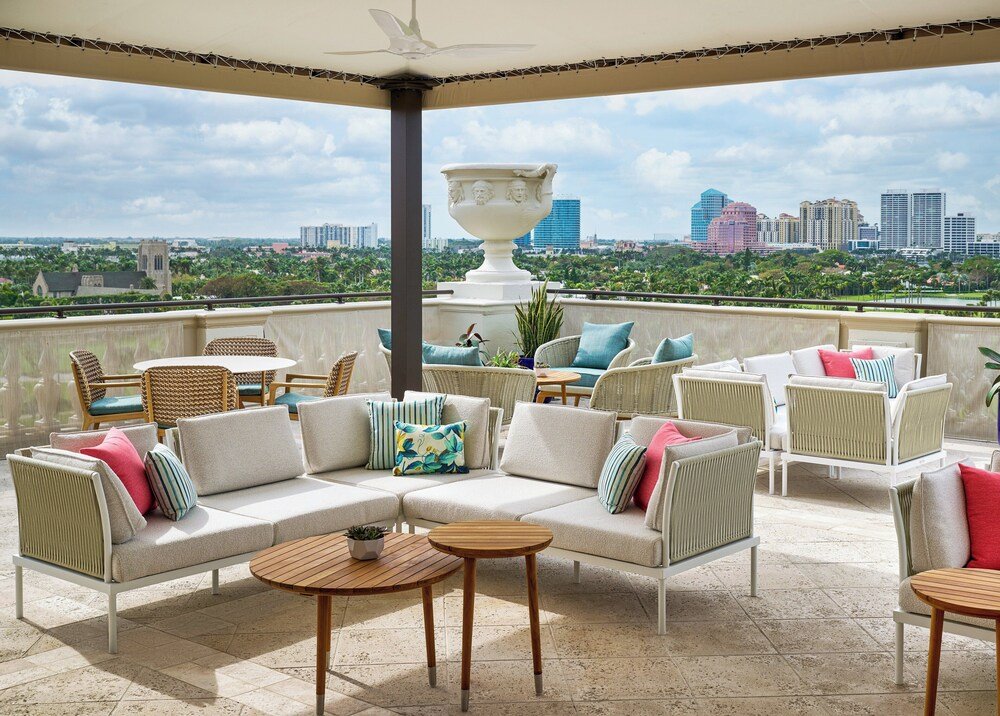Rooftop terrace with wicker furniture