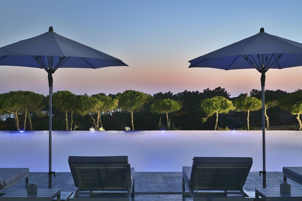 Poolside area with loungers