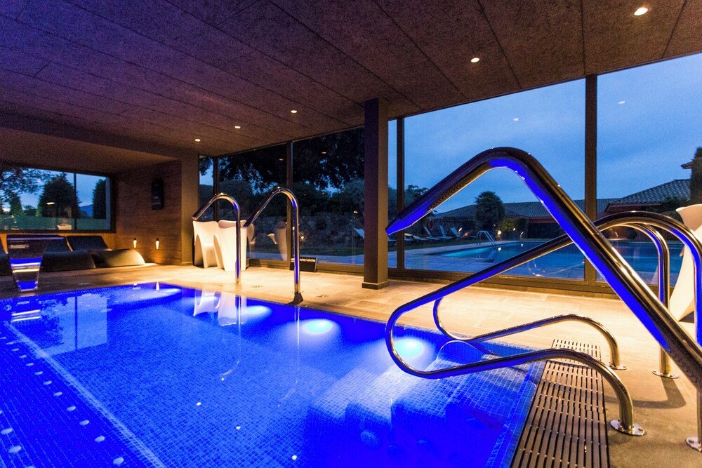 Indoor swimming pool at the hotel in Navata, Spain
