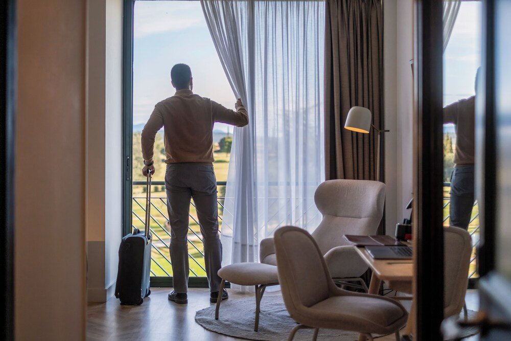 Hotel room with a bed at the Navata golf and spa hotel