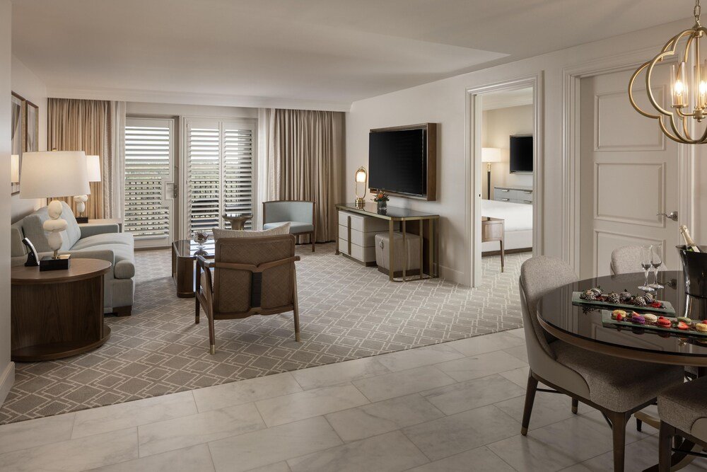 Living area in a guest suite at Waldorf Astoria Orlando