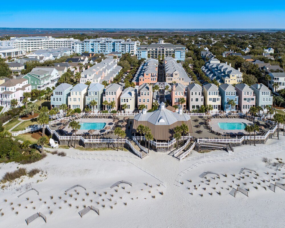 Resort with several buildings and swimming pools at Wild Dunes Resort